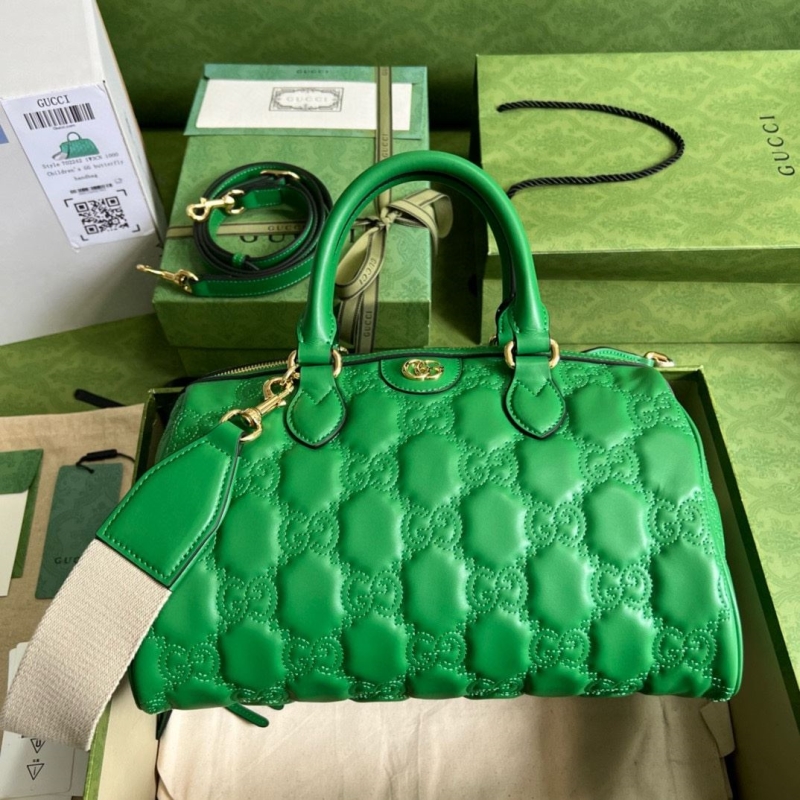 G*u*i top handle bags